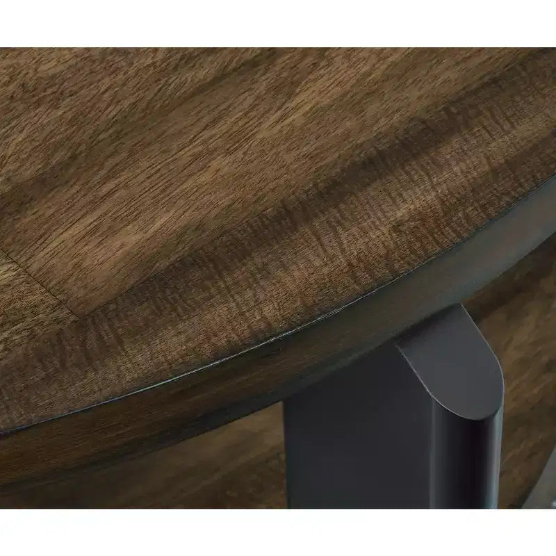Table basse ronde marron et noire avec roulettes, 1 personne